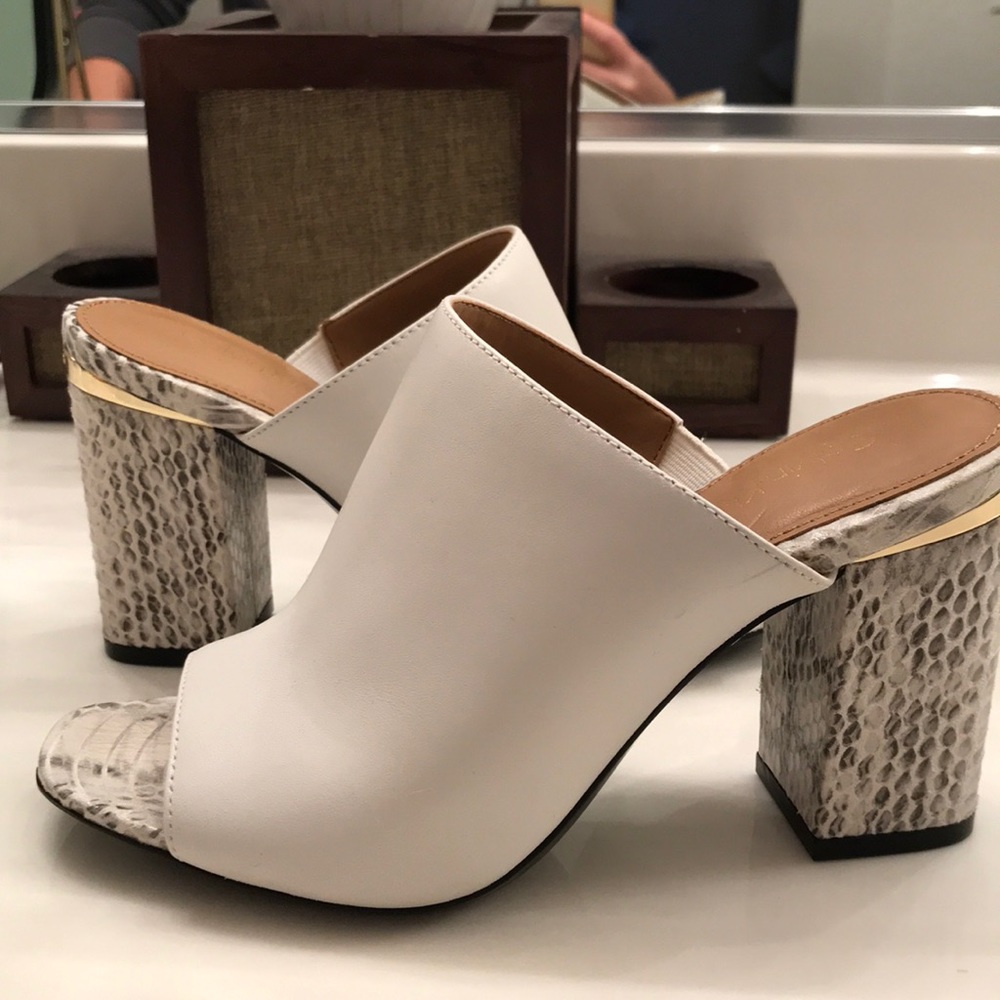 Women’s Calvin Klein white and snake print mules